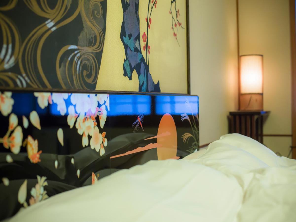 Kinosaki Onsen Hanakouji Saigetsu เรียวกัง
